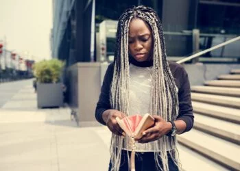 African descent checking her wallet