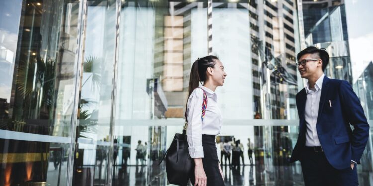 Asian business people in a city