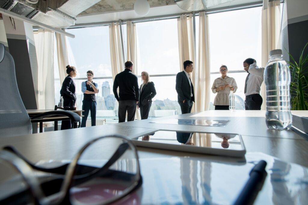 Business people taking break after meeting