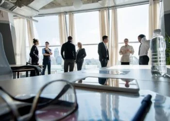 Business people taking break after meeting
