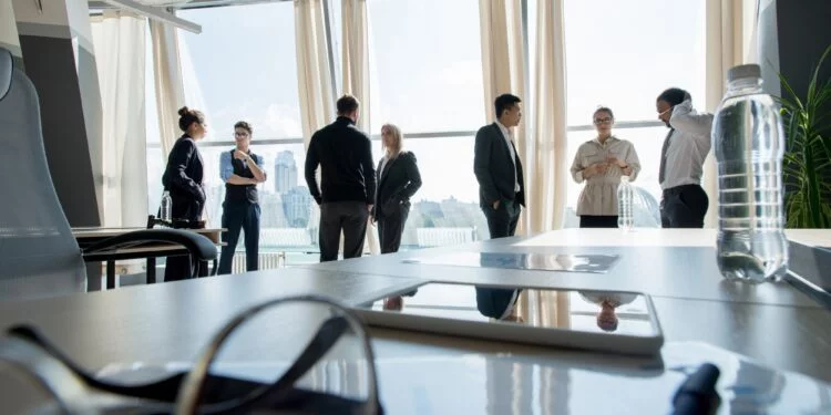 Business people taking break after meeting