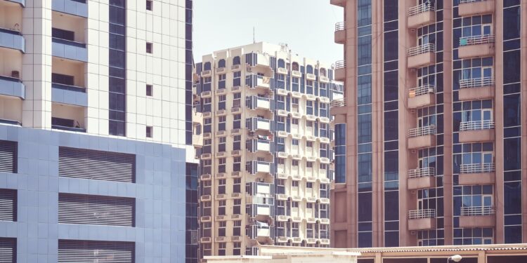 Aziz Developer realizes the 284-unit mixed-use project in Dubai 1 Close up picture of residential buildings facades.