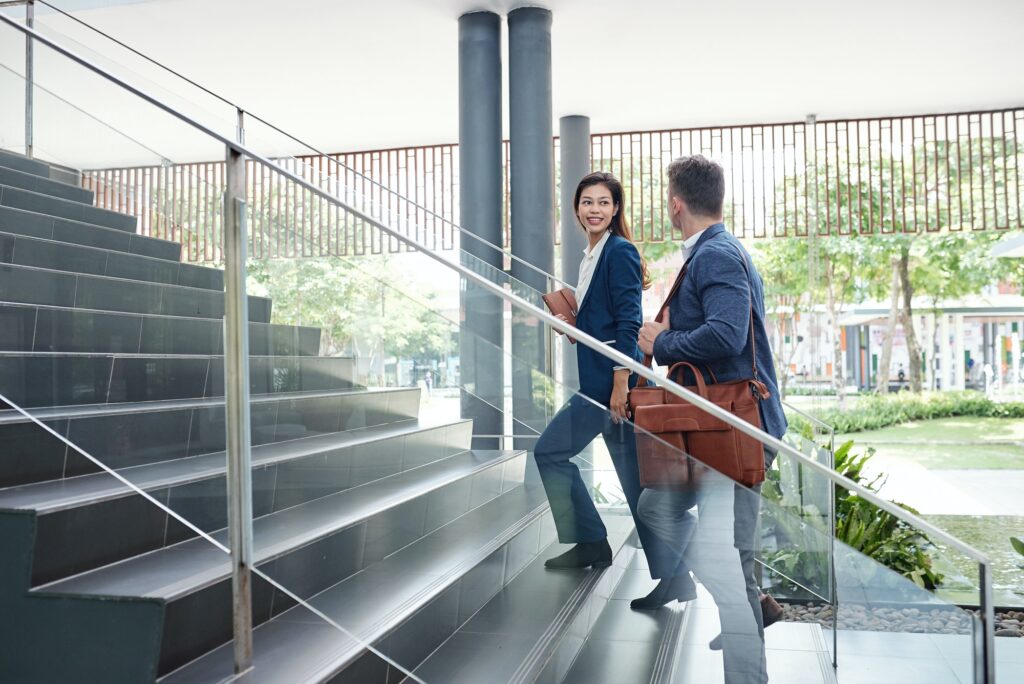 Colleagues walking up the stairs