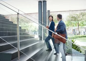 Colleagues walking up the stairs