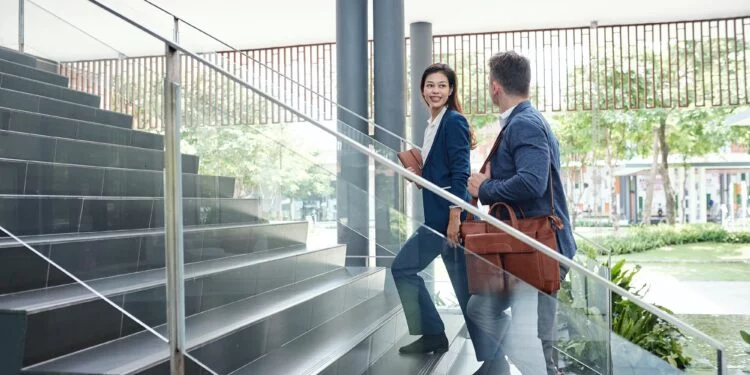 Colleagues walking up the stairs