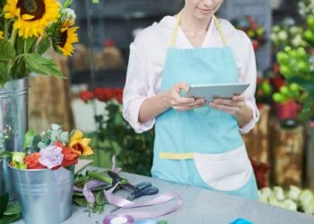 Florist Using Tablet in Shop
