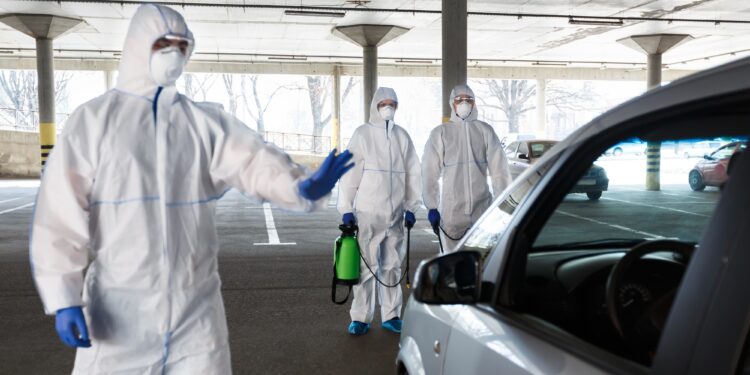 Saudi Arabia Expands Travel Ban to 53 Countries Amid COVID-19 Concerns 1 Medical worker in virus protective hazmat ban to leave