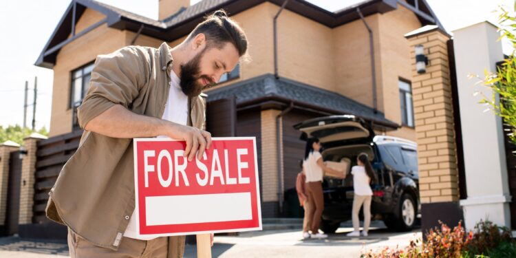 Placing For sale sign