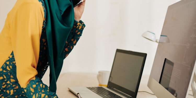Serious businesswoman talking on phone