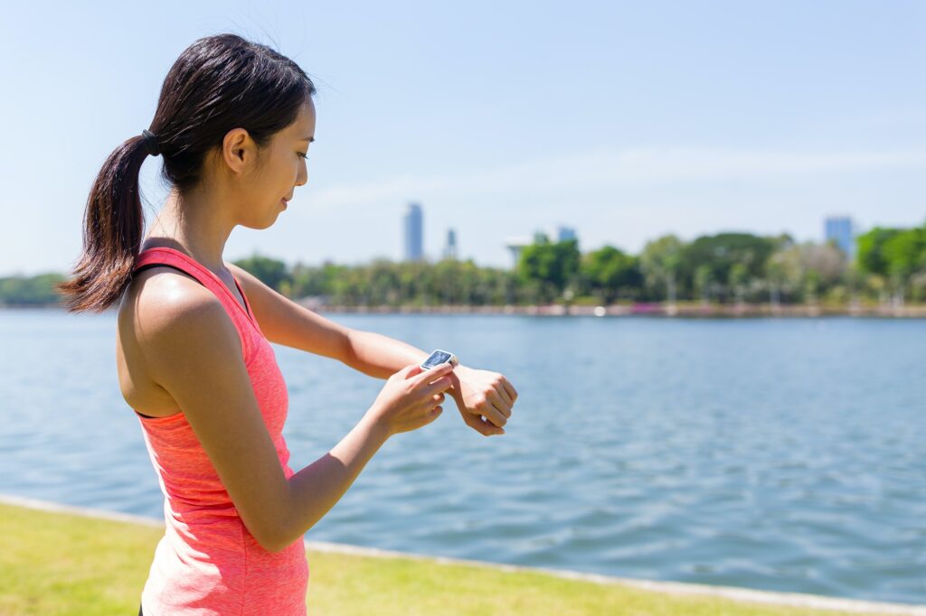 Woman use of smart watch for training exercise