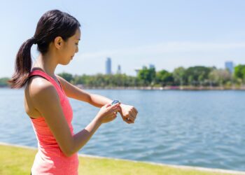 Woman use of smart watch for training exercise