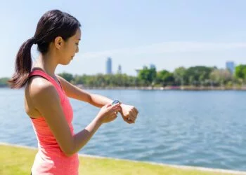 Woman use of smart watch for training exercise