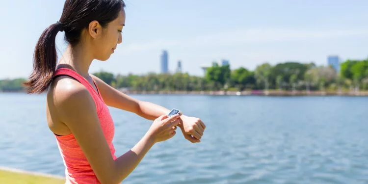 Woman use of smart watch for training exercise