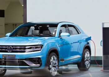 Volkswagen raised the target for profit margin after it posted record first-half earnings