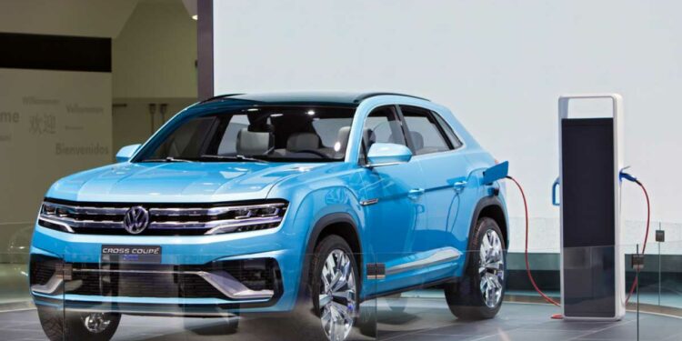 Volkswagen raised the target for profit margin after it posted record first-half earnings