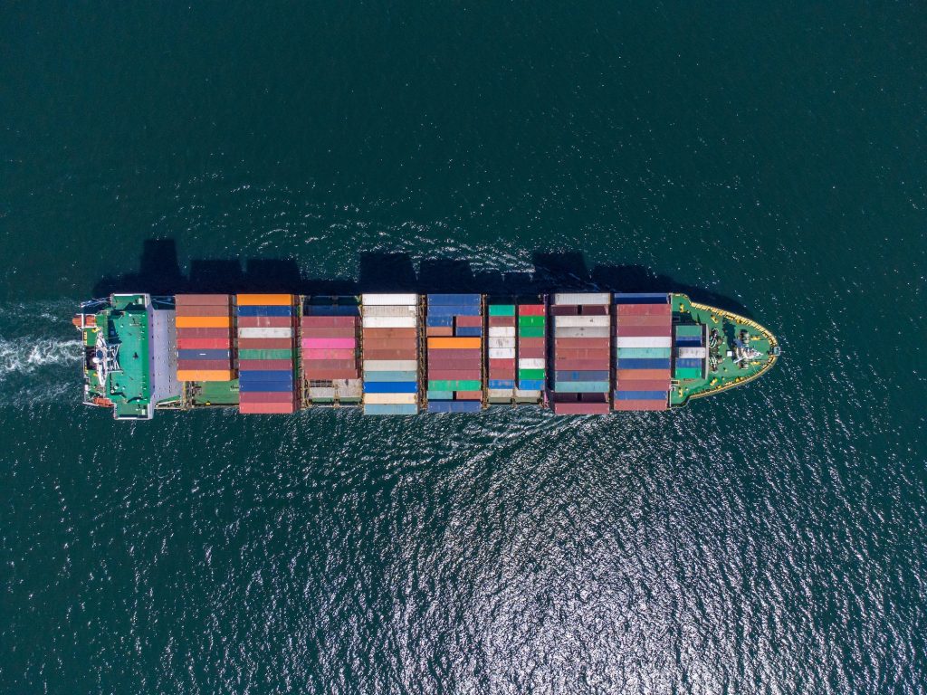 Aerial top view container ship, shipping or transportation concept background.